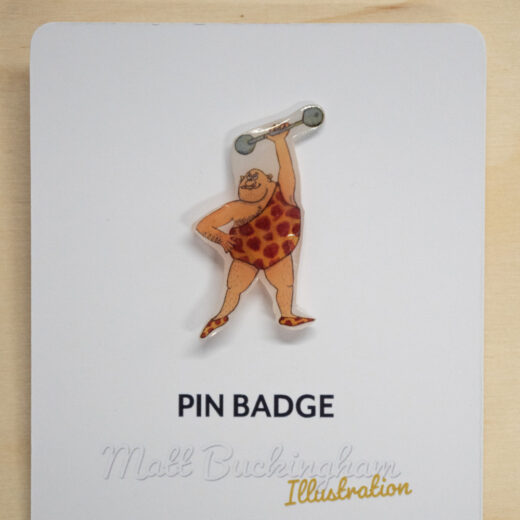 Strong Man pin badge by Matt Buckingham