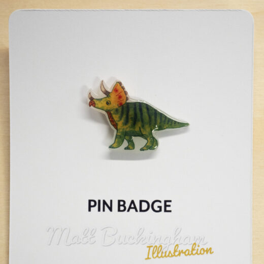 triceratops pin badge by Matt Buckingham